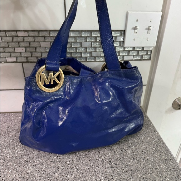 Michael Kors Handbags - Michael Kors Shiny Blue Shoulder Bag with Gold Accent